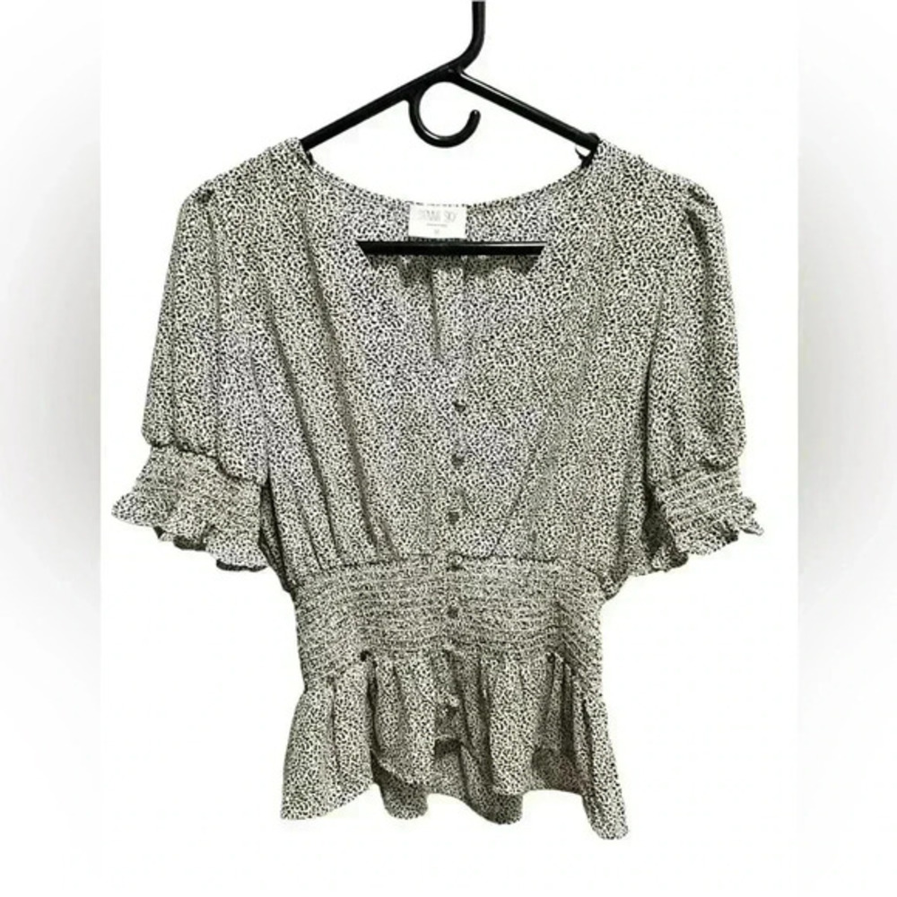 Sienna sky white and black leopard cheetah print top